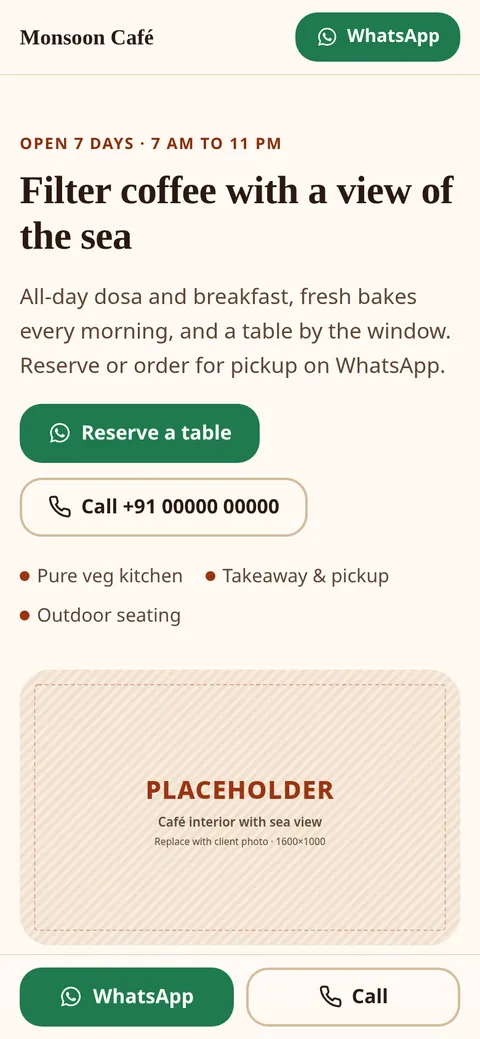 Demo café site on a phone with serif headings and a reserve-a-table button.